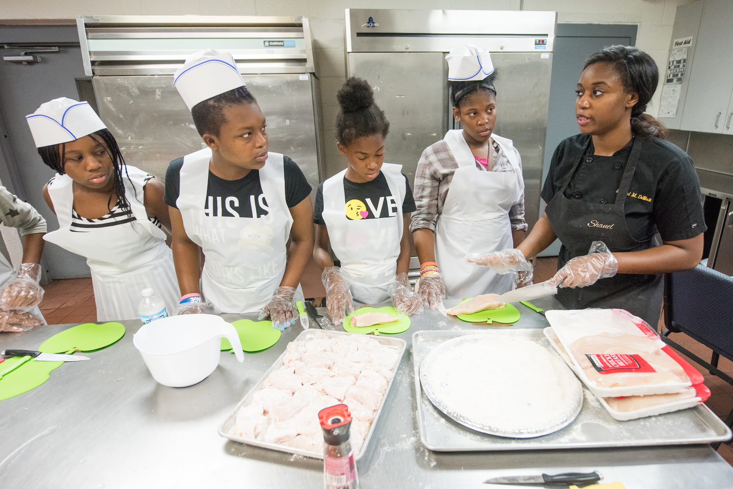 Chef Shanel DeWalt teaches culinary arts to youthgroup at Matrix Center in Detroit.