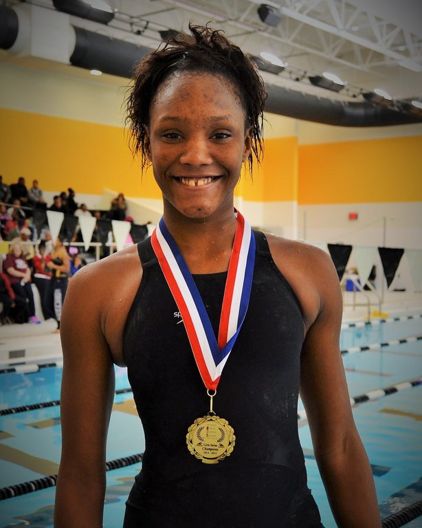 World-class competitive deaf swimmer Detroiter AnQuniece Wheeler returns to city rec center to train, inspire others