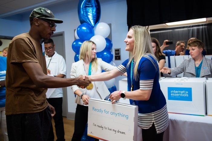 Comcast surprises 150 low-income veterans, 100 youth with free laptops